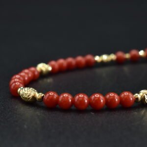 Улаан шүрэн хүзүүний зүүлт